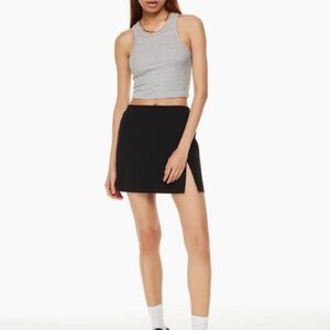 Aritzia Black Slit miniskirt size 8, New